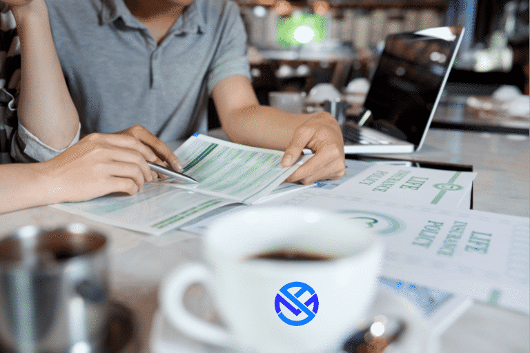 Gentleman studying maximum fund cash value life insurance policy at desk